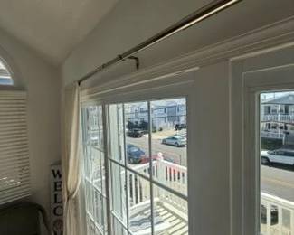 Curtain rod; curtains; sliding glass doors