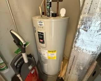 50-gallon electric hot water heater; vacuum cleaner