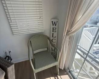 Accent chair; Welcome sign; blinds; curtains & rods