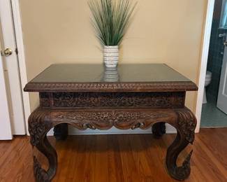 Beautiful, Ornate Hand-carved Teak Table from Thailand
Teak table - 46" long, 32" wide, 32" high
Glass top is removable
Definite statement piece!