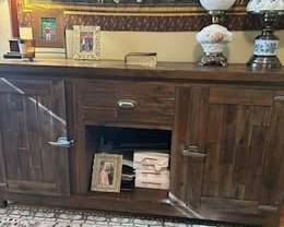 Reclaimed Solid Wood Console / Credenza
Doors open to reveal two shelves and one pull out drawer (on each side)
Center section has larger drawer and open shelf
71" w x 19" d x 36" t
Very heavy solid wood