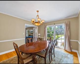 Solid wood, Wide Dining Table and 6 upholstered chairs
78" long x 44" wide
It has 1 extension piece in it, but can be removed to make it 60" long
6 chairs - 2 arm chairs + 4 armless chairs - with gold fabric seating.