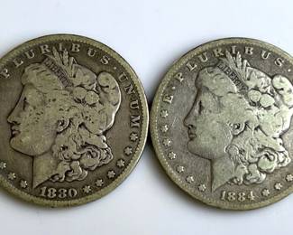 Two Morgan Silver Dollars (1880 and 1884)