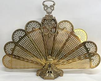 Brass peacock fireplace fan