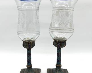 Pair of Kashmiri enamelled gilt brass candlesticks with etched glass hurricanes