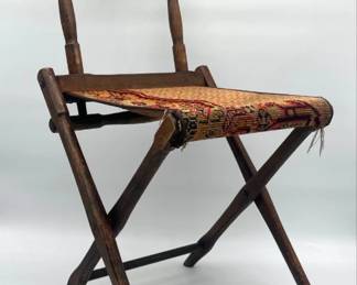 Antique folding camp chair with tapestry covered seat