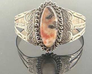 Handsome sterling Navajo petrified wood cuff