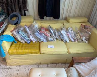 Slipcovered yellow granny/cottage core sofa