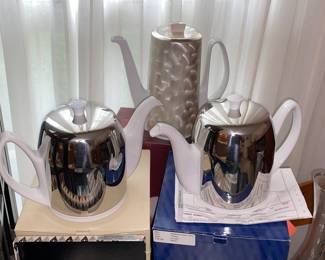 China tea and coffee pots with insulating sleeves
