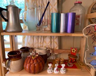 Pitchers, metallic cups, oj jar and more