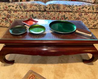 Asian style inspired low coffee table with glass top