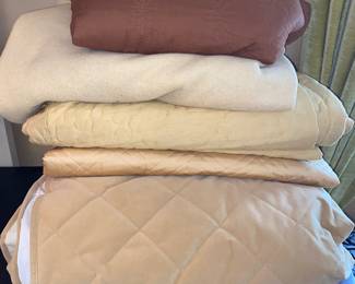 Loads of blankets and bedding