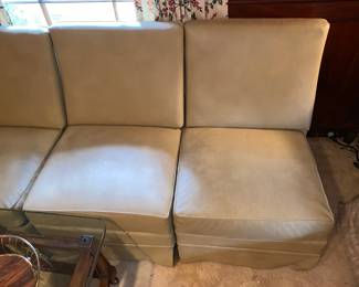 1 of 4 cream/tan vinyl chairs