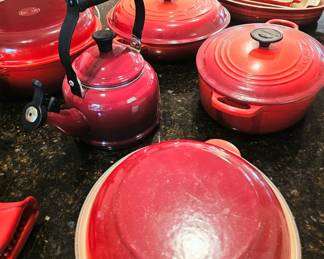 Assorted red Le Creuset . Sold separately