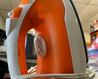 New, never used Iron with garment material selection dial. $20