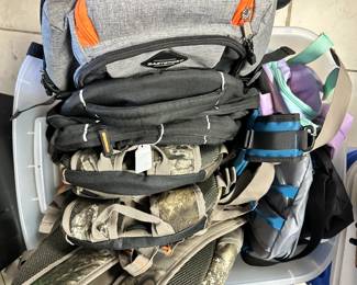 Bin of New Backpacks