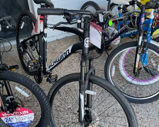 Kids bikes and new, adult bikes