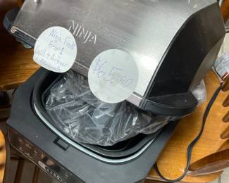 Ninja 6 in 1 with attachments. For Grilling, Air-frying and more.