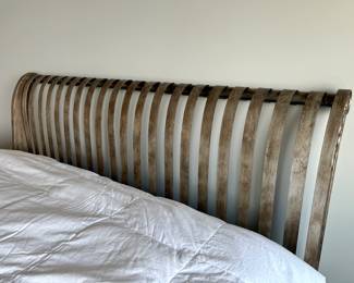 Metal headboard of the king size bed
