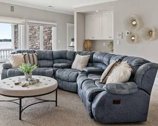 Blue leather reclining sofa (coffee table not available for sale)
