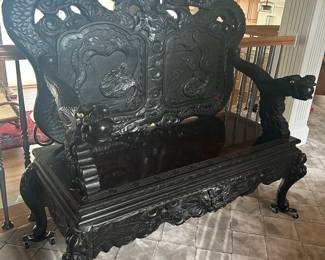 antique Asian dragon settee with ivory eyes