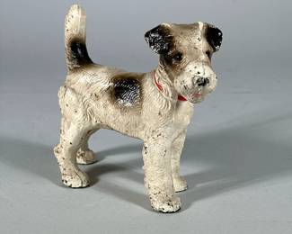 Cast iron terrier dog, possibly Hubley | Cast iron painter Terrier door stop. Possibly Hubley. no apparent marking - h. 5.5 x w. 2.5 x l. 7 in