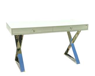 JONATHAN ADLER CHANNING DESK | Contemporary glamour style writing table, having a white top with two split width drawers with oversized acrylic knobs over polished chrome X-form legs
Dimensions: h. 30 x w. 54 x d. 24 in