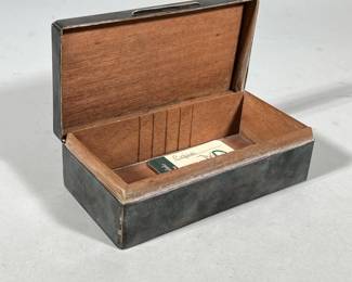 ANTIQUE ABERCROMBIE & FITCH STERLING HUMIDOR | Abercrombie & Fitch Sterling silver humidor, dated on top, marked on bottom “Abercrombie & Fitch / Made in England” and marked with sterling hallmarks - h. 2 x w. 6.75 x d. 3.5 in