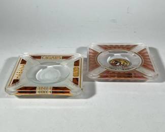 (2pc) Glass Ashtrays | La Gloria Cubana is signed and Habana Fine Cigars is missing one of its ball feet.
Dimensions: w. 8 x l. 8 in