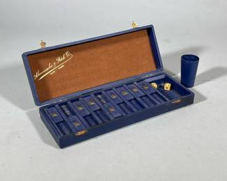 AMBERCROMBIE & FITCH GAMES BOX | Leather-bound game box with small leather cup, 2 dice, and 9 numbered lanes - h. 3 x w. 12.25 x d. 4.5 in
