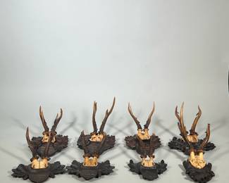 (8pc) Antique Hunting Trophies | Black Forest German wall trophies/awards dating from 1897-1928. Carved nuts and oak leaves on wooden mount. Each piece has name of winner and date. - h. 15 x w. 7 in (Largest)