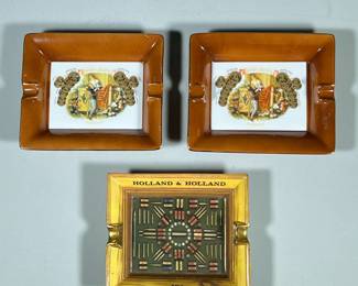 (3pc) Mixed Ashtrays | Including two matching Romeo y Julieta Habana trays and a Holland and Holland with hunting bullets pictured. - h. 1.5 x w. 6 x l. 7 in (Holland and Holland)