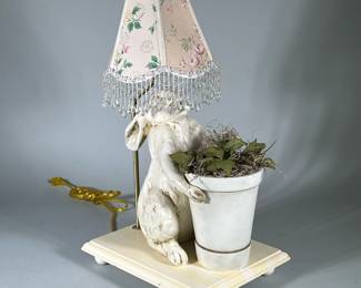 Posh Tots Lamp | Bunny holding pot of faux greens and moss mounted on base with round balled feet. Floral shade with bead tassels. - h. 22 x w. 9 x d. 12.5 in (With estimated harp.)