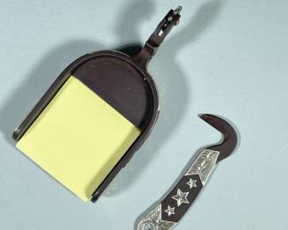 (2pc) Paperweight and Post-it Holder | Glass paperweight with Westley Richard’s & Co. logo, gun and rifle makers. Metal spur with silver stars holder for post-its. - h. 1 x w. 2.5 x l. 4 in (Paperweight)