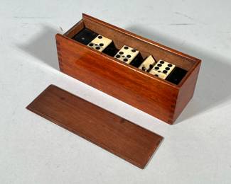 ANTIQUE BONE DOMINO SET IN WOODEN BOX | Antique dominoes designed in ebony wood back & bone carved face in wood box - h. 2.75 x w. 2.5 x l. 7.75 in