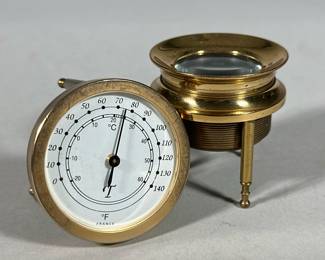 (2pc) Van Cort Mass Tabletop Magnifier and Barometer | Both made from heavy brass with makers marks on base - h. 2 x w. 2 x l. 2 x dia. 2 in