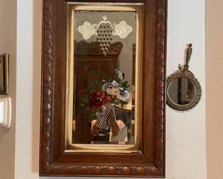 Carved wood framed mirror with flower design $150