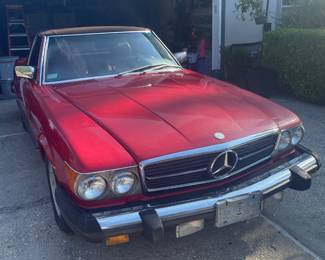 Start Bid $10,000.1986 Mercedes 560SL
Style: Roadster Convertible.
Red  – 205939 miles. 
V8, 4.7 liter. 2WD. SILENT BIDS CLOSE 08/11 at NOON 
