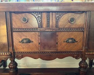 Beautiful Antique Buffet piece. The woodwork is absolutely impressive!
