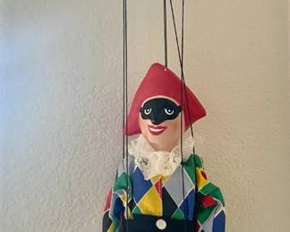 One of a number of marionettes