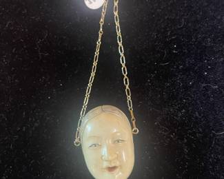 Netsuke on a 10 ct chain