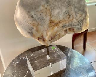 Sculpture on a marble top occasional table