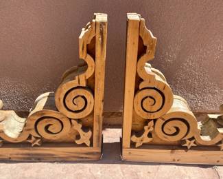 A pair of wood corbels