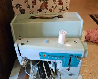 2 Blue Sewing Machines