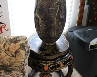 Asian inspired side table, pottery vase with dried flowers.