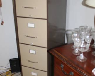 File cabinet, glassware.