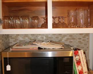 Microwave, crystal glassware, cookbooks.
