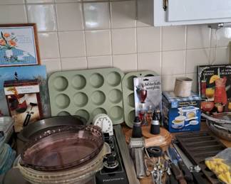Kitchen bakeware and utensils--pie plates, muffin pans, other useful items, many vintage