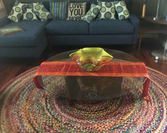 Coffee table, rug, couch, pillows, lamps