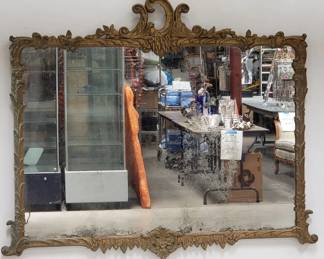 Antique carved gilt wood wall mirror